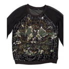 Black sequin top with a pattern on a white background