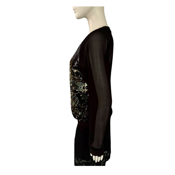 Black long-sleeve top with sequin detailing on a mannequin against a white background