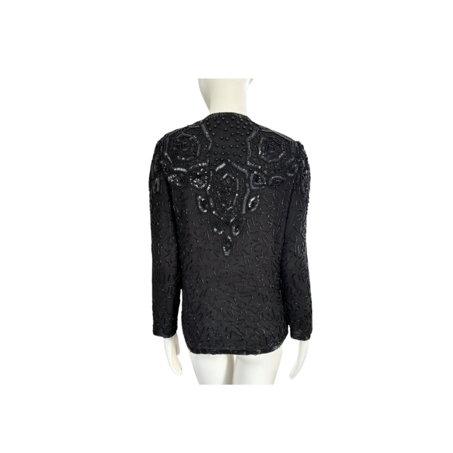 Black beaded jacket on a mannequin against a white background