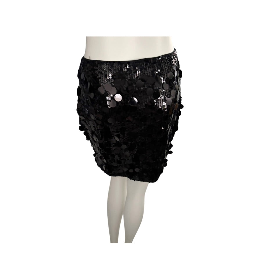 Black sequin skirt on a mannequin against a white background
