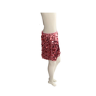Pink sequin skirt on a mannequin against a white background