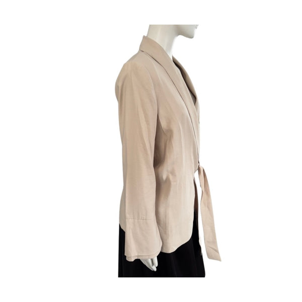 Beige jacket on a mannequin against a white background