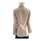 Beige blazer on a mannequin against a white background