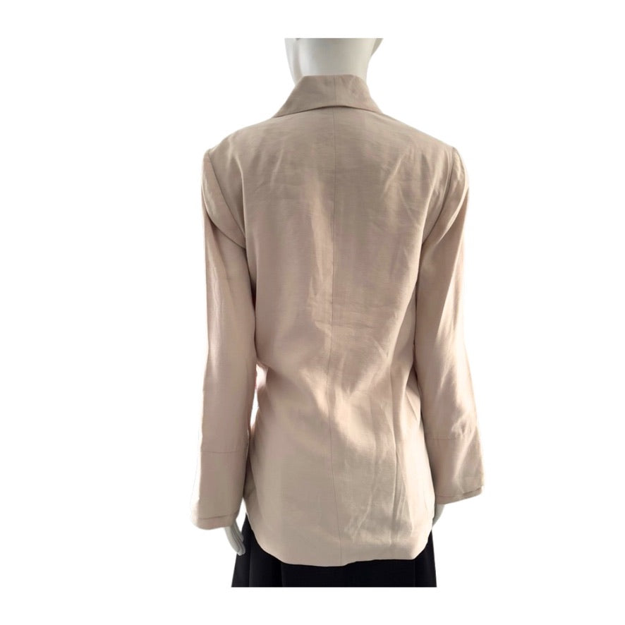 Beige blazer on a mannequin against a white background