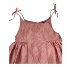 Pink floral dress with thin straps on a white background