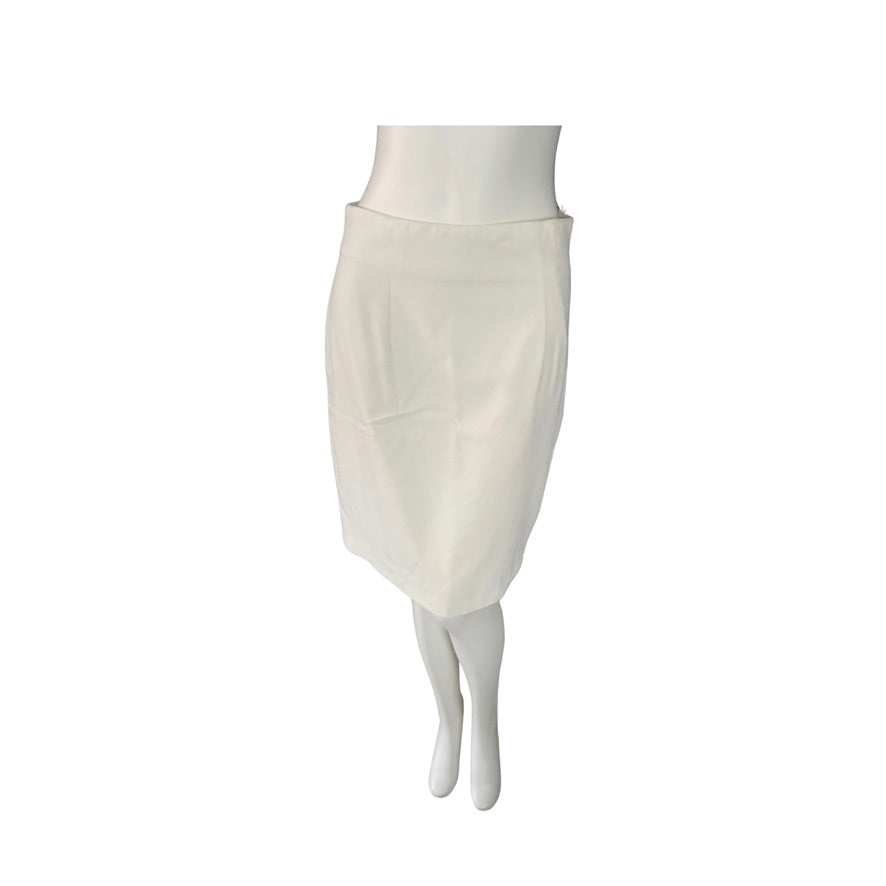Cream pencil skirt on a mannequin against a white background