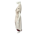 Mannequin wearing a beige dress with a white background