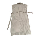 Beige sleeveless dress with a belt on a white background