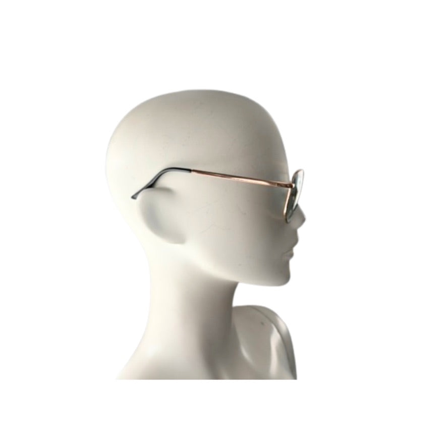 Sunglasses on a mannequin head against a white background