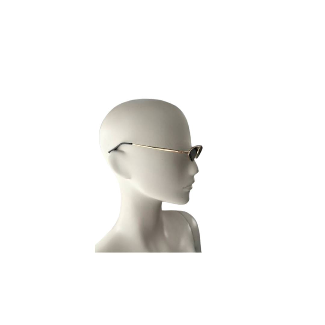 Mannequin head wearing a pair of sunglasses on a white background