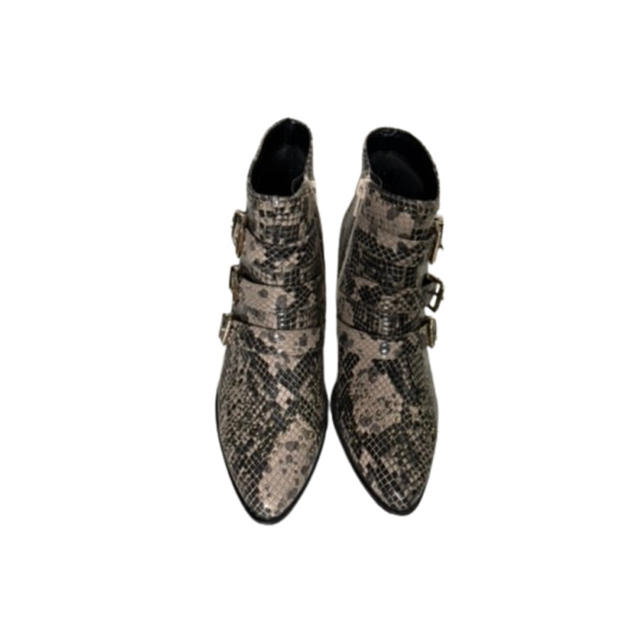Snakeskin-patterned boots with buckles on a white background