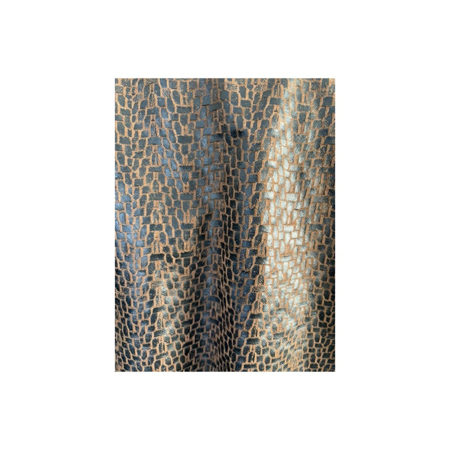 Textured patterned fabric swatch on a white background