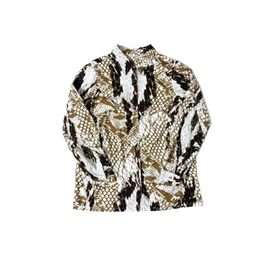 Snakeskin patterned top on a white background