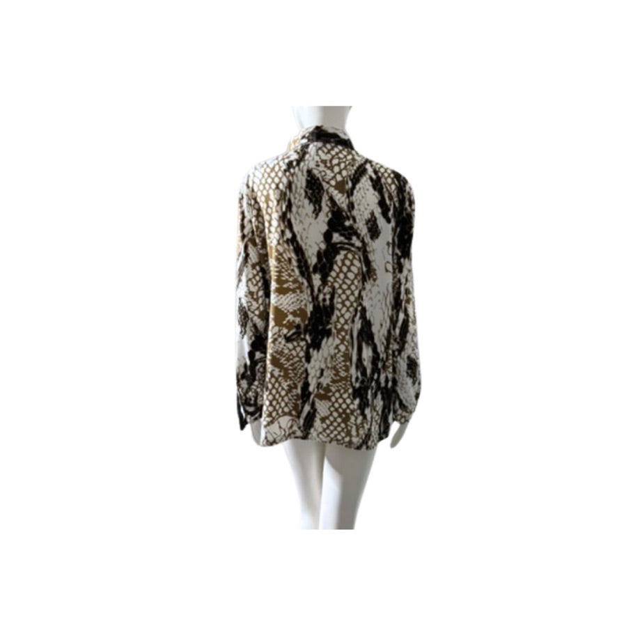 Mannequin wearing a patterned jacket on a white background
