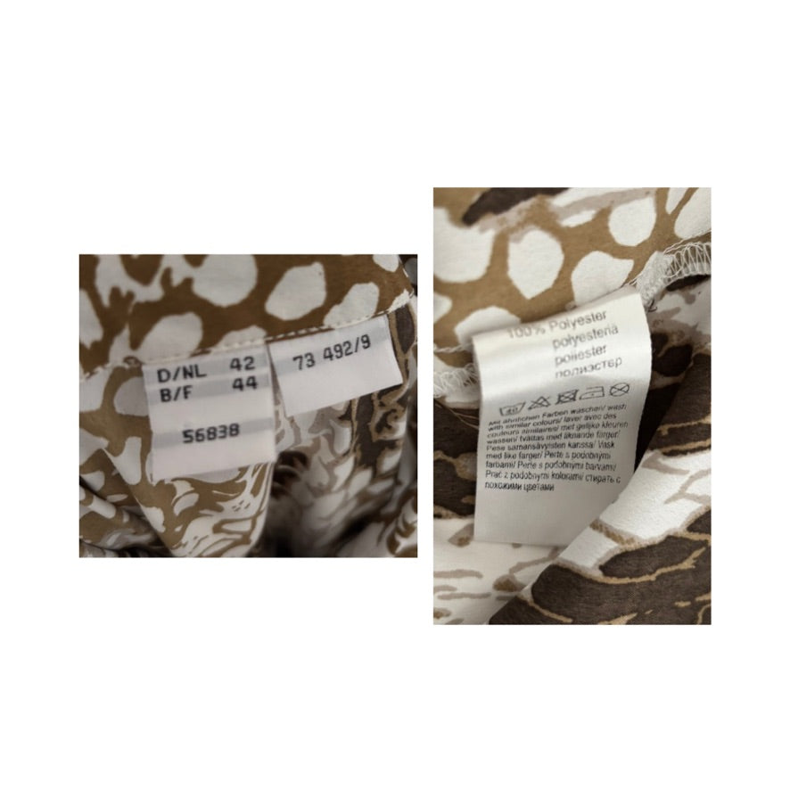 Close-up of a patterned fabric with a label on a white background