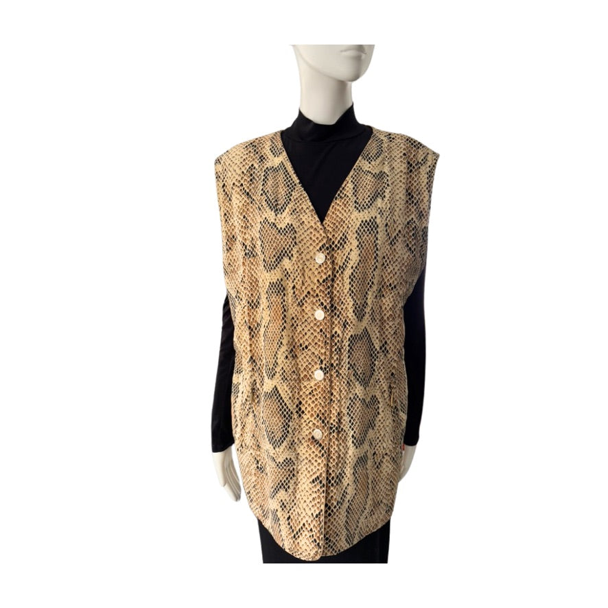 Mannequin wearing a snake print vest over a black shirt on a white background