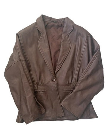 Brown leather jacket on a white background