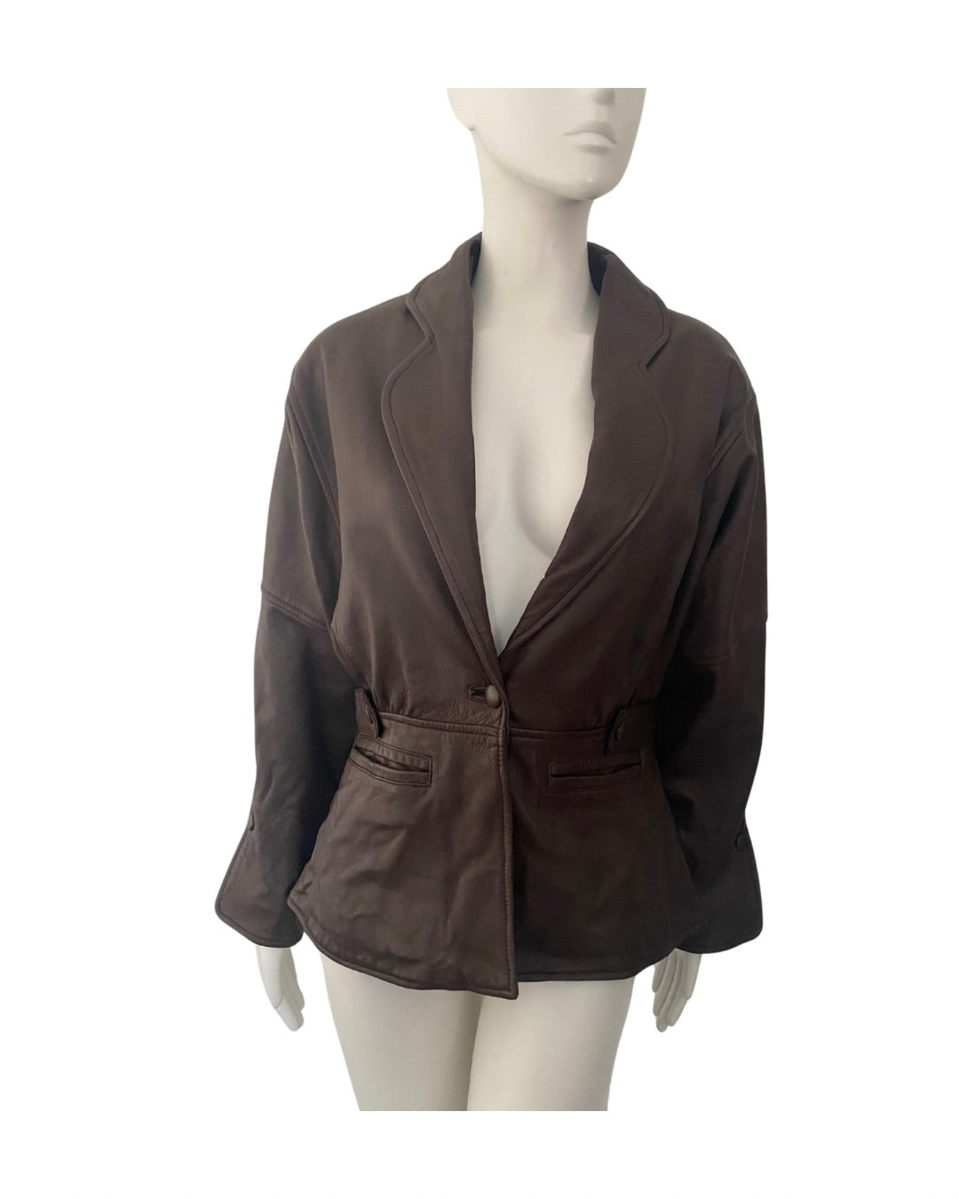 Brown jacket on a mannequin against a white background