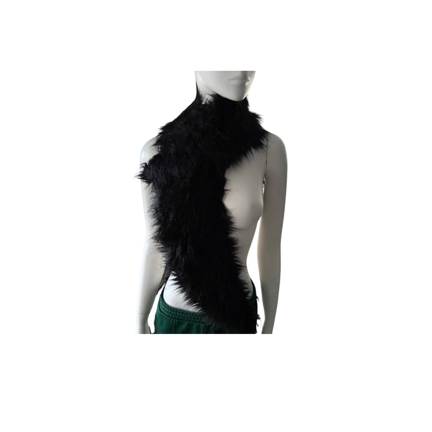 Mannequin wearing a black scarf on a white background