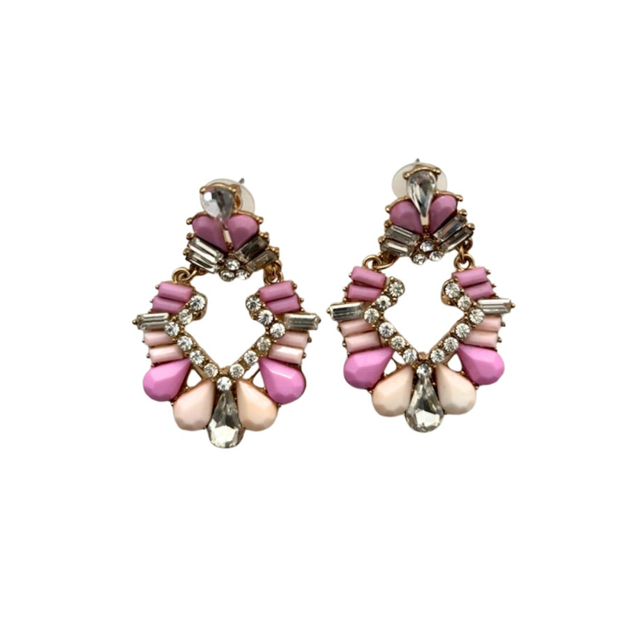 Pair of pink and gold earrings on a white background