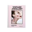 Book titled 'Vintage Jewellery' with a cover featuring an earring and a woman's face on a pink background.