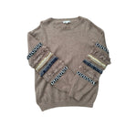 Brown sweater with decorative sleeves on a white background
