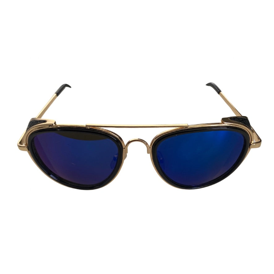 Sunglasses with gold frame and blue lenses on a white background