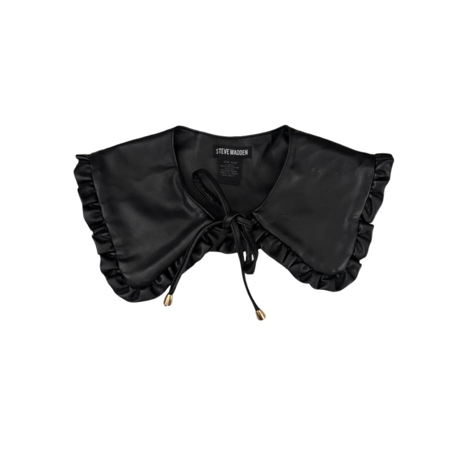 Black leather collar with ruffles on a white background