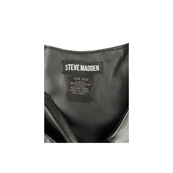 Close-up of a Steve Madden label on a black leather product.