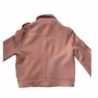 Pink suede jacket on a white background