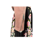 Close-up of a floral-patterned garment with a pink zipper.