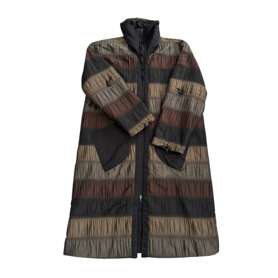 Multicolored striped coat on a white background