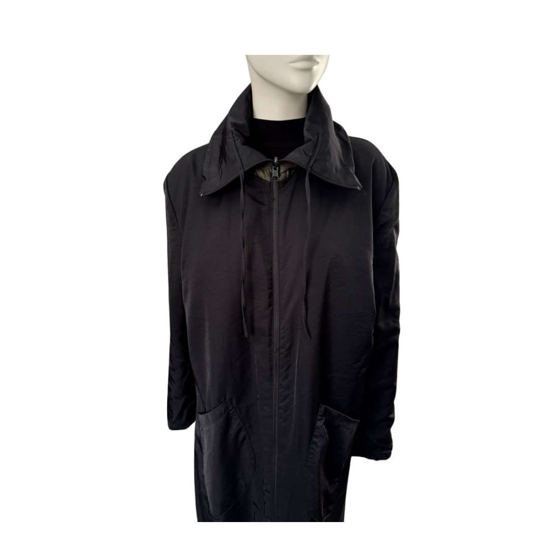 Black coat on a mannequin against a white background