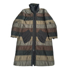 Long, patterned coat with a mix of colors on a white background