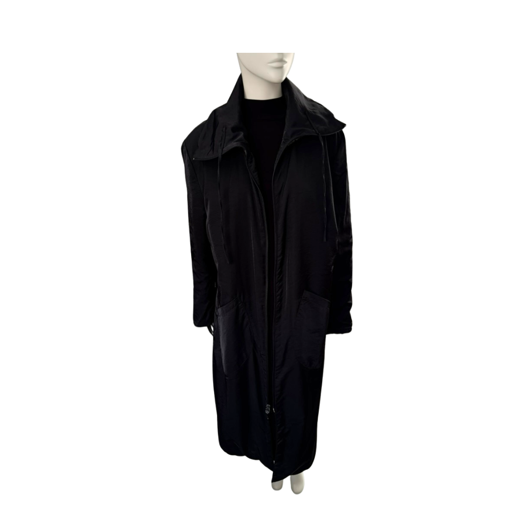Black coat on a mannequin against a white background