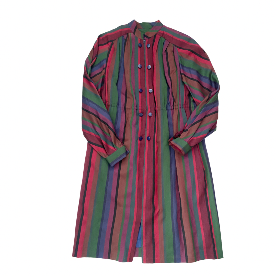 Multicolored striped dress on a white background