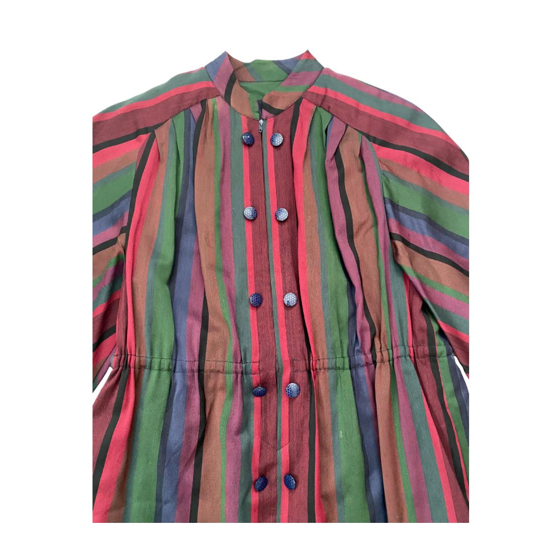 Multicolored striped dress with buttons on a white background