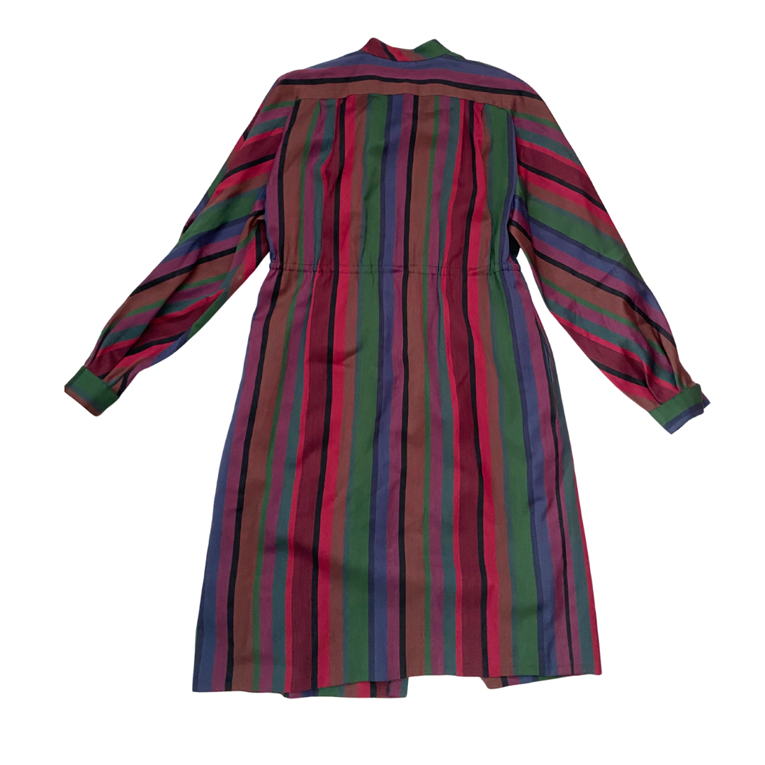 Multicolored striped dress on a white background