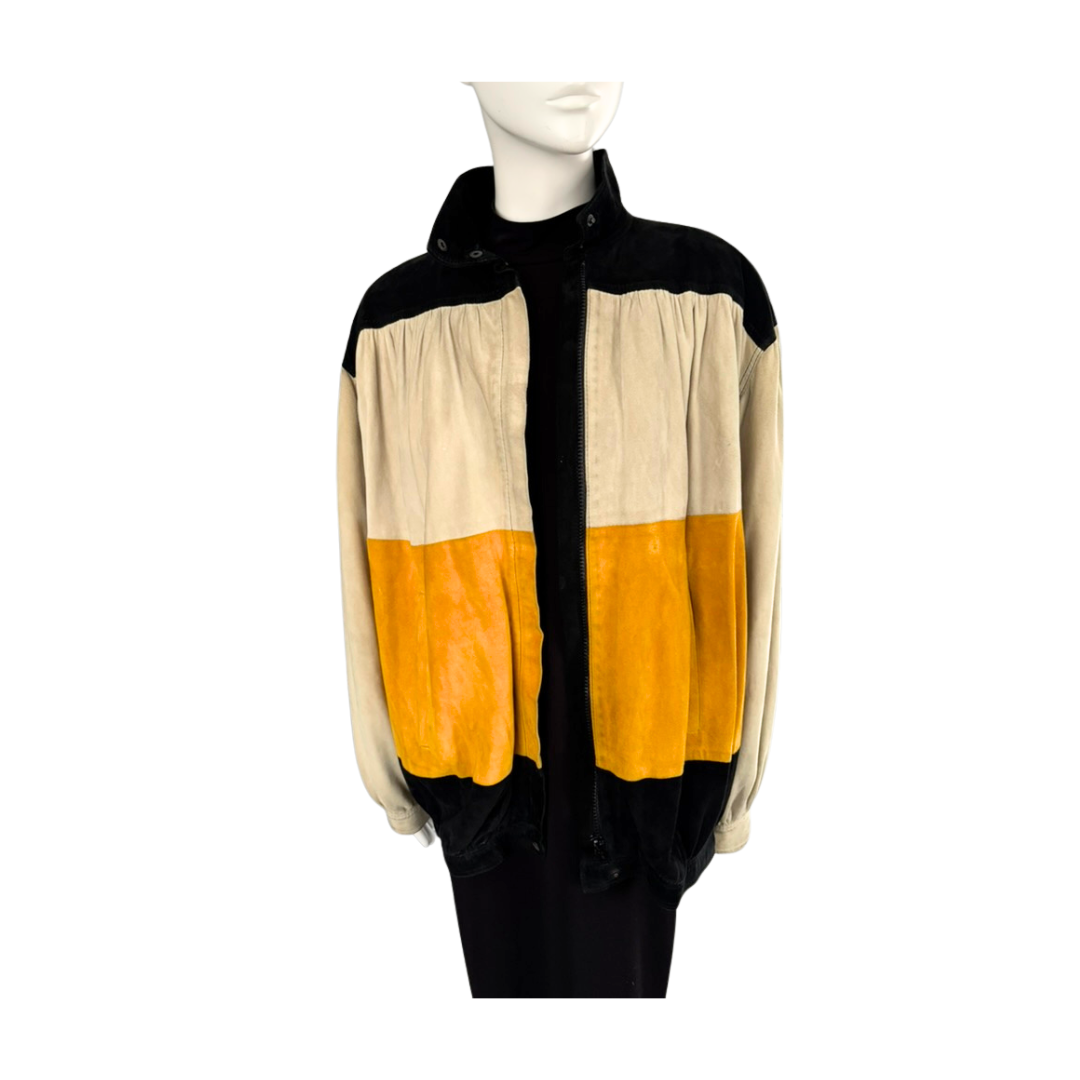 Mannequin wearing a jacket with black, beige, and orange color block design on a white background