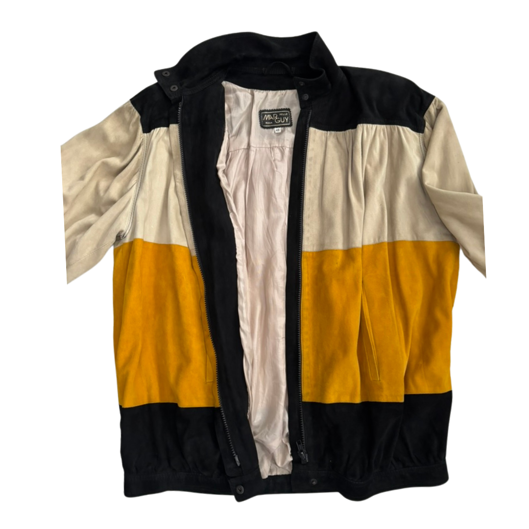 Color-blocked jacket with black, beige, and yellow sections on a white background