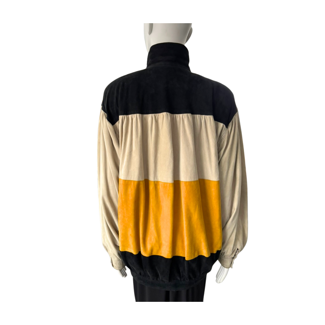 Color-blocked jacket with black, beige, and yellow on a mannequin against a white background