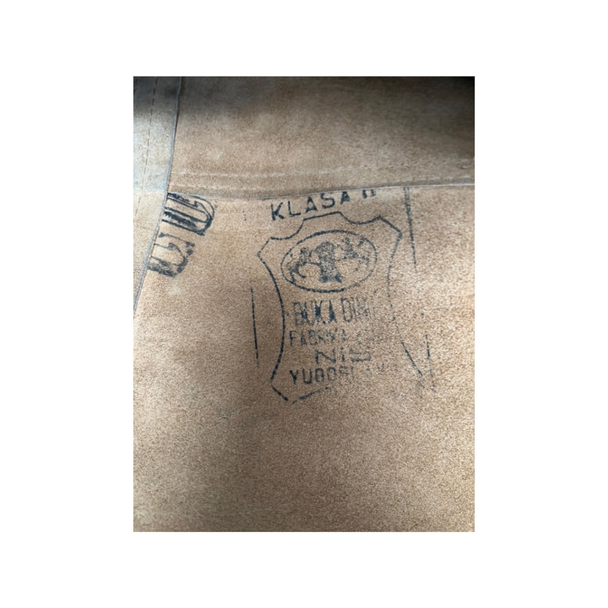 Cardboard box with visible branding and text on a white background