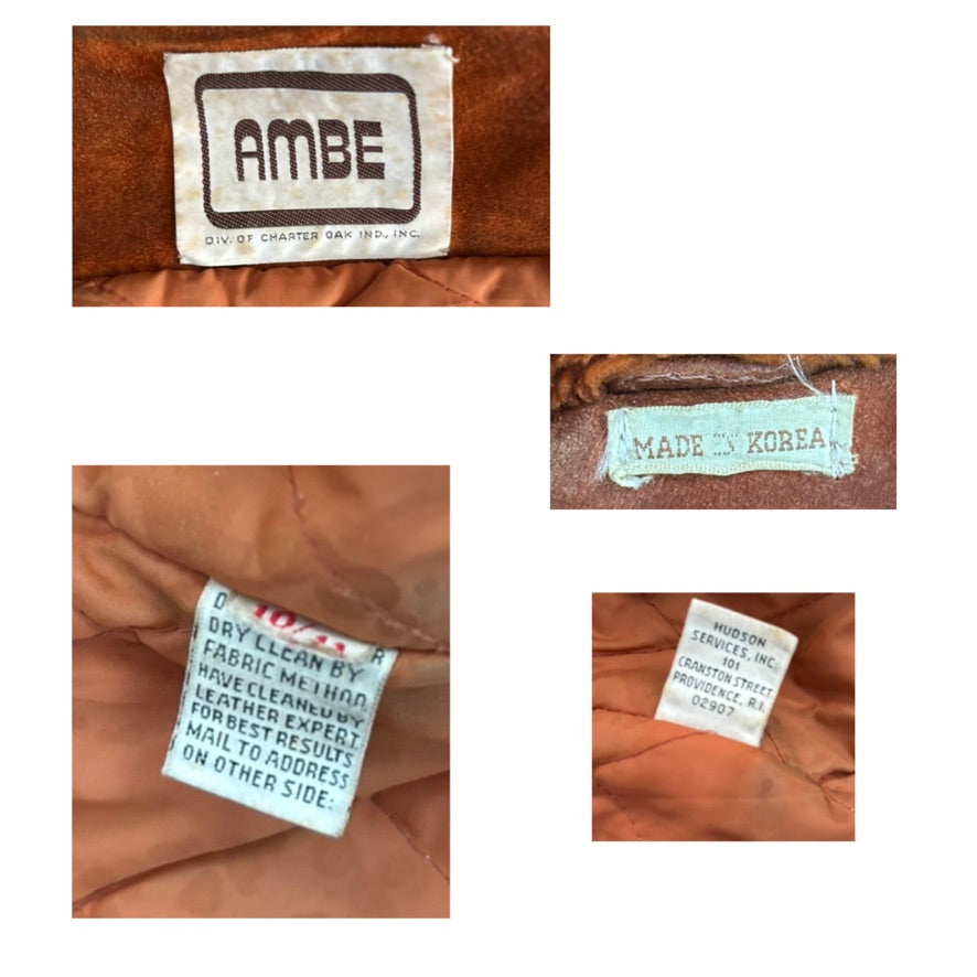 Close-up of labels on a brown leather product with 'AMBE' branding.