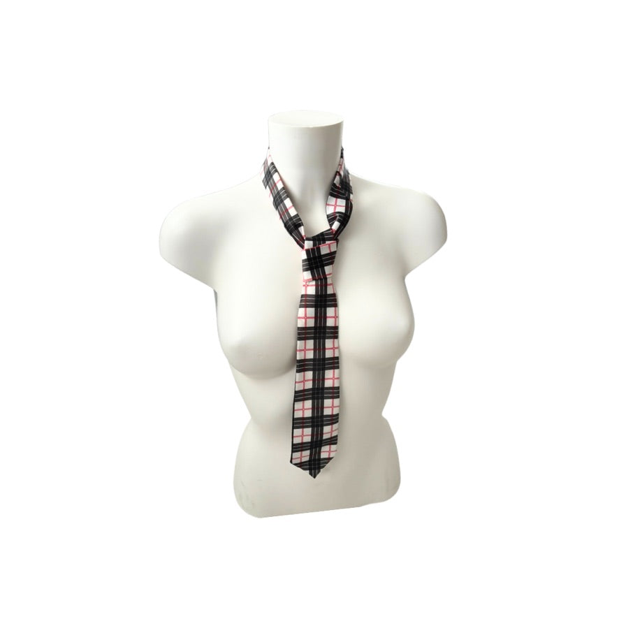 Plaid tie on a mannequin torso against a white background