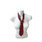 Red plaid tie on a mannequin with a white background