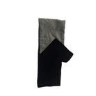 Black and beige checkered fabric on a white background