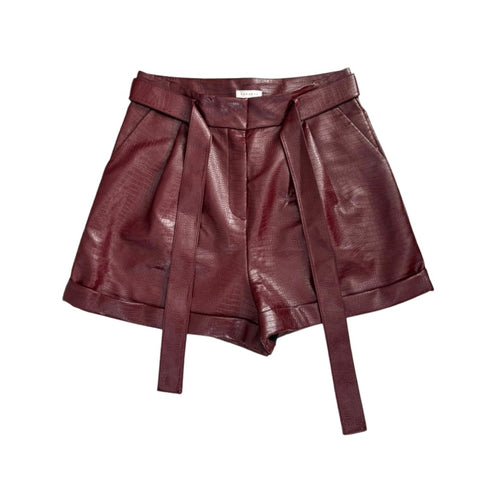 Burgundy leather shorts with a belt on a white background