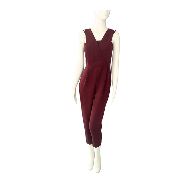 Maroon jumpsuit on a mannequin against a white background