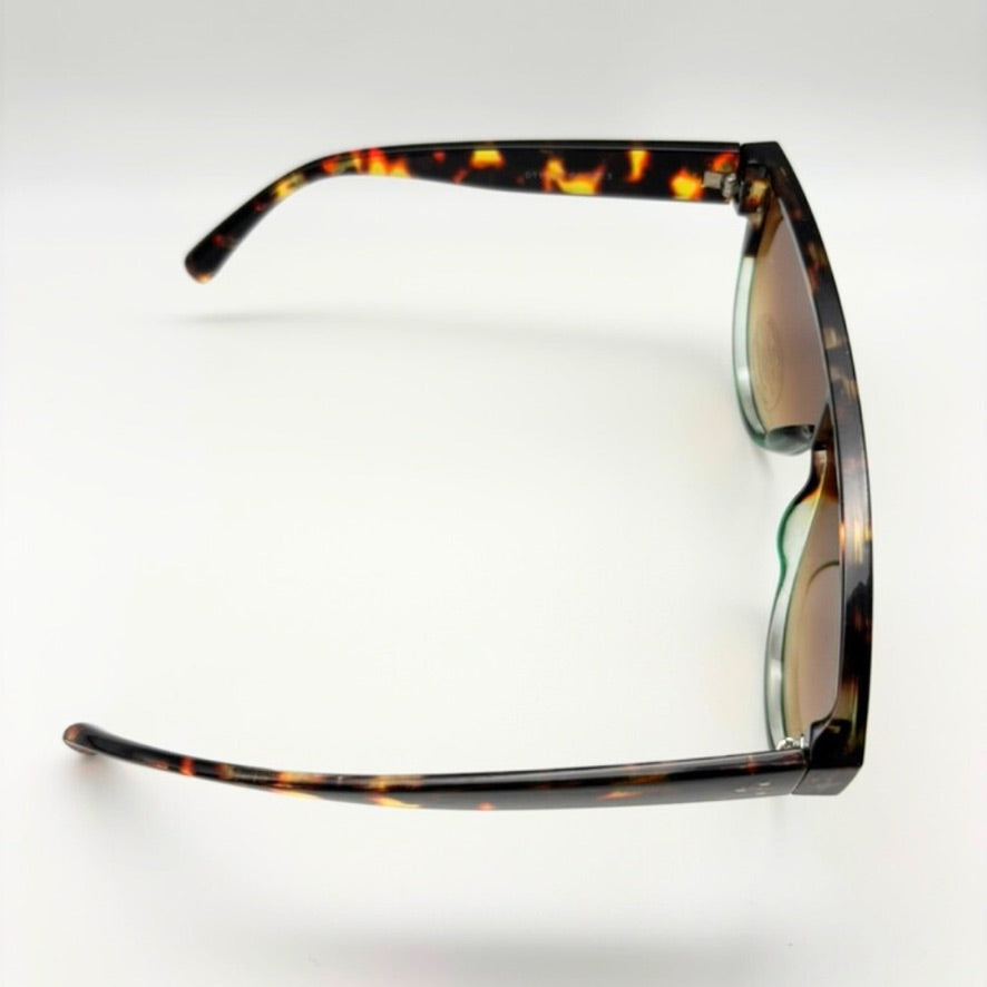 Sunglasses with tortoiseshell frame on a white background