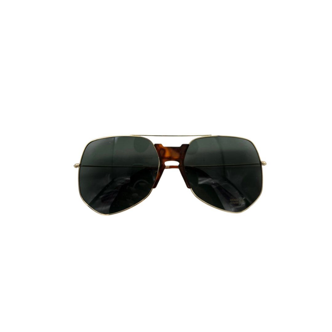Sunglasses with gold frame and dark lenses on a white background
